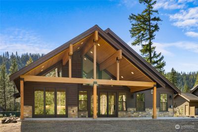 Large covered back patio up against the conservancy. | Image 2