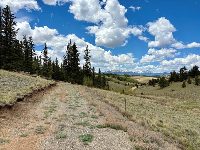 View of street with a rural view and a mountain view | Image 24