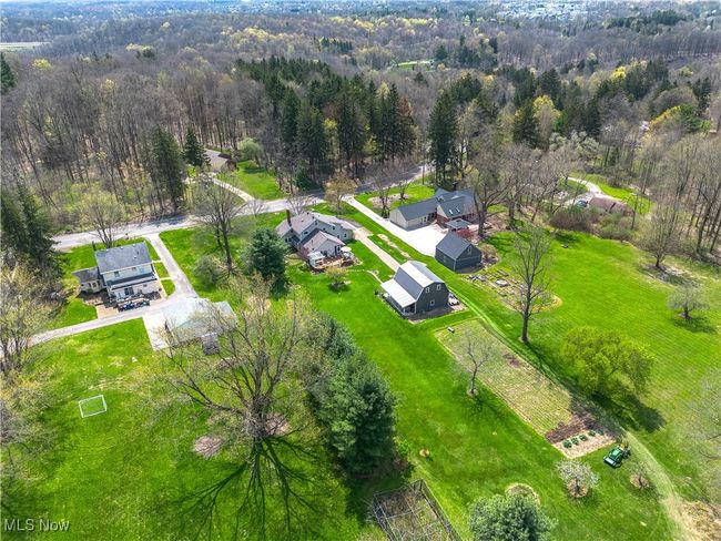 Aerial view featuring a wooded view | Image 26