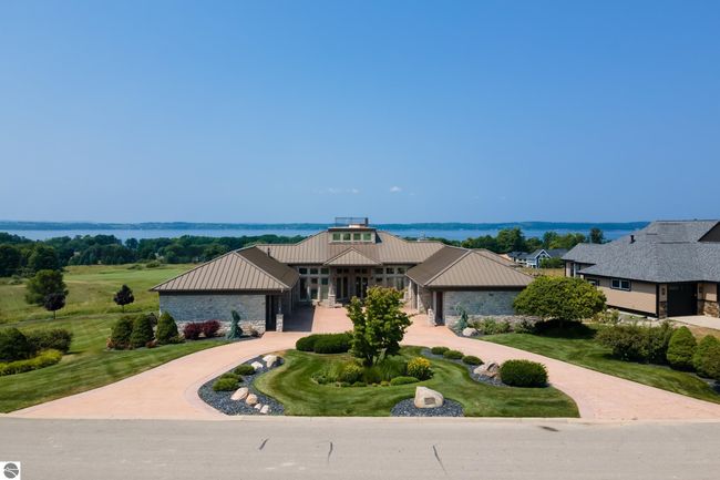 4173 Dornoch Ct, House other with 6 bedrooms, 4 bathrooms and null parking in Williamsburg MI | Image 66