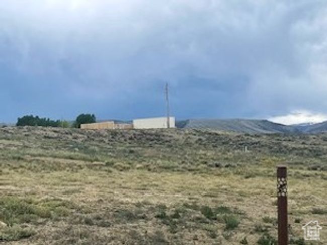 View of yard with a mountain view and a view of rural / pastoral area | Image 7