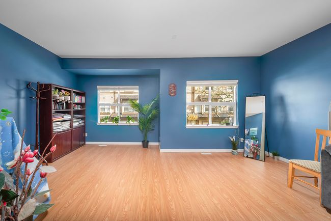 Unfurnished room with baseboards and wood finished floors | Image 20