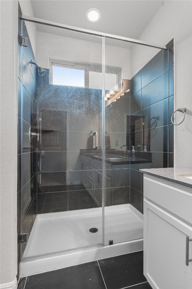 Full bathroom with vanity and a shower stall | Image 17