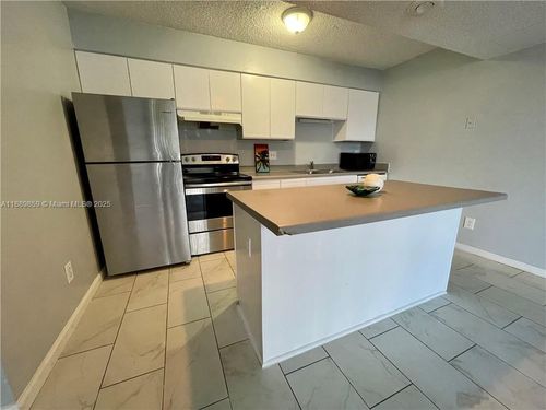 apt-a101-3985 Mcnab Rd, Pompano Beach, FL, 33069-4943 | Card Image