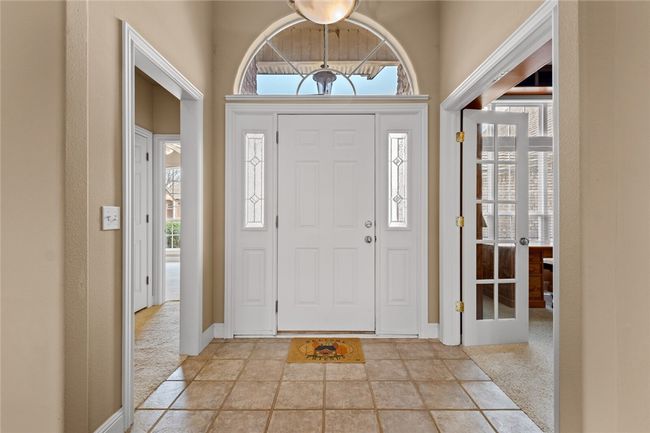 Natural light pouring in to the entry way | Image 9