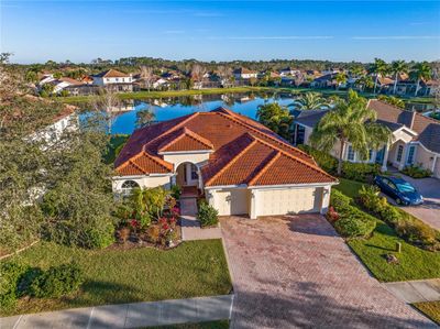 11879 Granite Woods Loop, House other with 4 bedrooms, 3 bathrooms and null parking in VENICE FL | Image 1