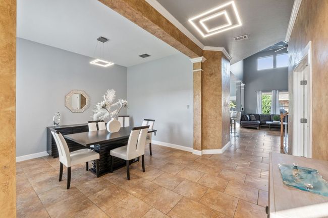 Another view of the formal dining area. | Image 14