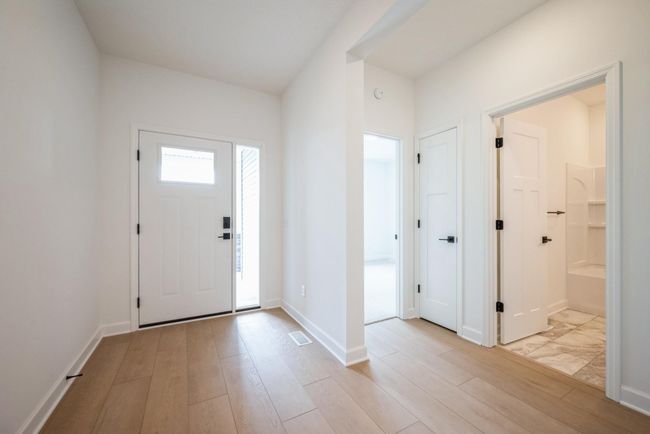Photo of actual home. Make the best first impression with this bright and open foyer! | Image 10