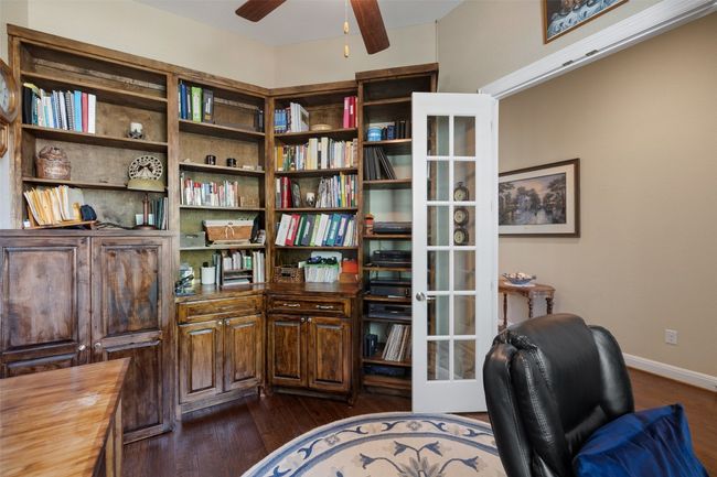 Dedicated home office conveniently located just off the front entry — perfect for privacy and productivity! | Image 30