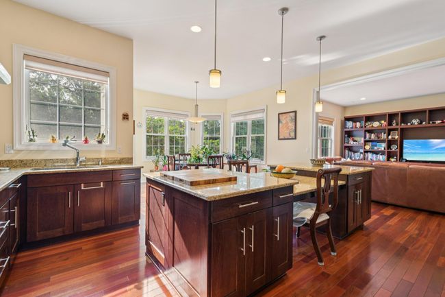 expansive Kitchen w Custom Breakfast or Center Island, Granite, and Sitting Room in the Middle | Image 15