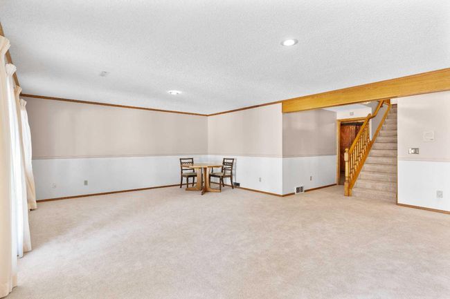 1038 Shawnee Rd Sw, Home with 3 bedrooms, 3 bathrooms and 4 parking in Calgary AB | Image 30