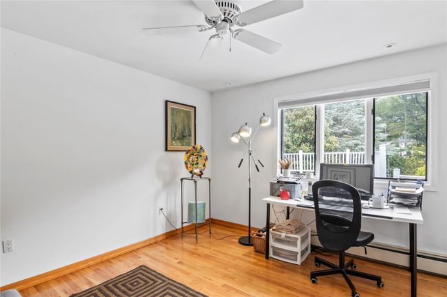 Office featuring baseboards, wood finished floors, and ceiling fan | Image 26