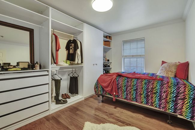 Bedroom with light hardwood / wood-style floors and ornamental molding | Image 27