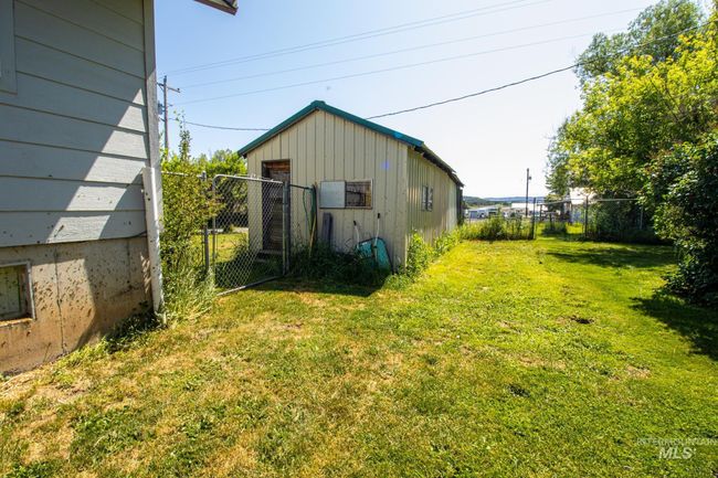 View of yard featuring a gate | Image 10