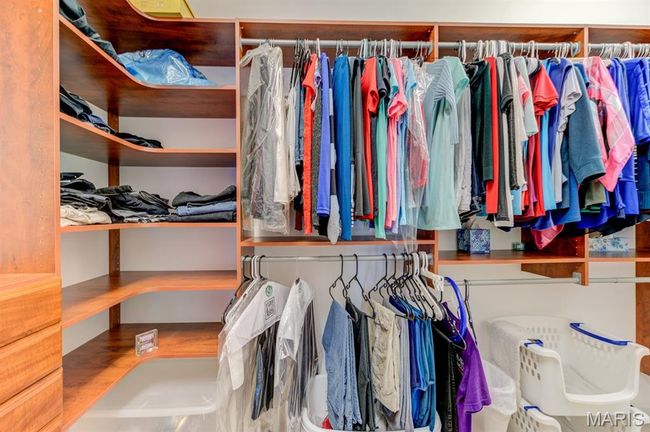 Don't miss the highlight of the Master Suite: a grand walk-in and walk-around closet with two entrances! | Image 21