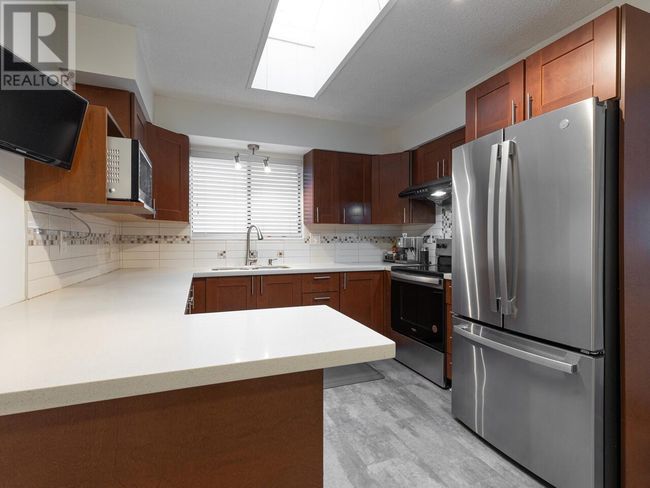 1269 Nestor St, House other with 4 bedrooms, 2 bathrooms and 1 parking in Coquitlam BC | Image 6