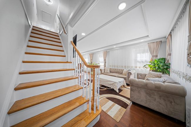 Stairway featuring recessed lighting and wood finished floors | Image 10