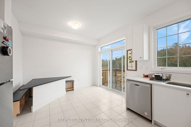84 Lyall Stokes Cir, House attached with 4 bedrooms, 3 bathrooms and 1 parking in Mount Albert ON | Image 11