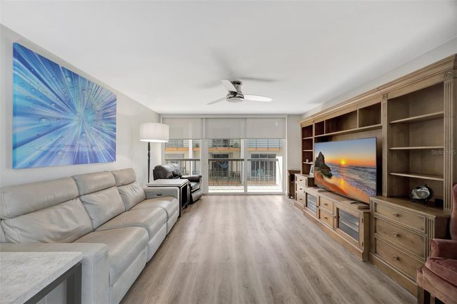 The living area is open and inviting. | Image 8