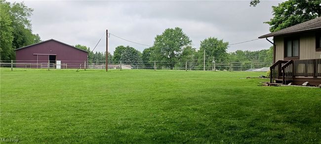 View of yard featuring an outdoor structure | Image 20
