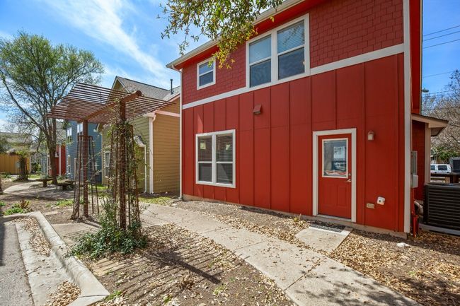 View of property exterior with board and batten siding | Image 19