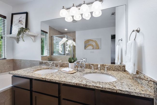 Granite countertops and dual vanities. | Image 25