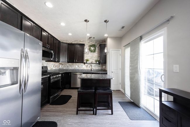 9770 Blue Violet Dr, Condo with 3 bedrooms, 3 bathrooms and null parking in Noblesville IN | Image 4