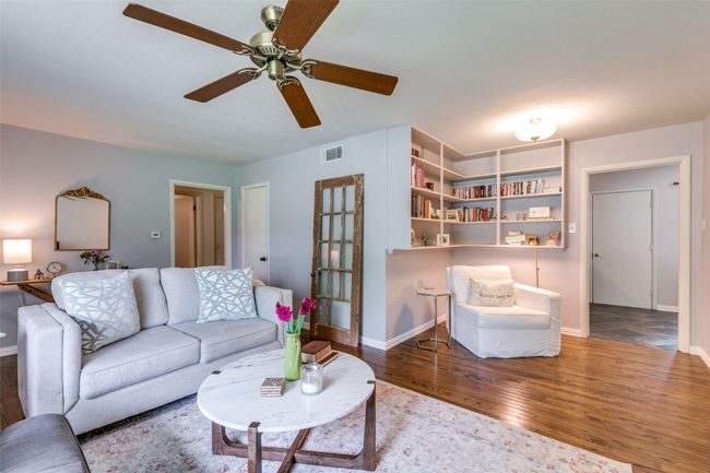 Living room opening to library nook or dining room | Image 7