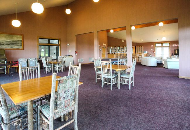 Clubhouse Game Room w/Fpl, bar, library, large screen TV. | Image 28