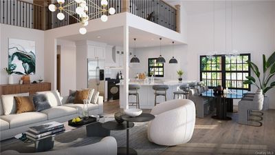 Living room featuring a notable chandelier, hardwood / wood-style floors, and a high ceiling | Image 3