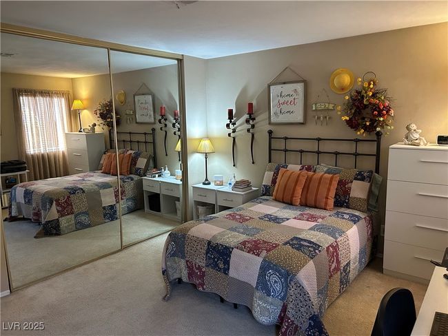 Bedroom featuring carpet and a closet | Image 20