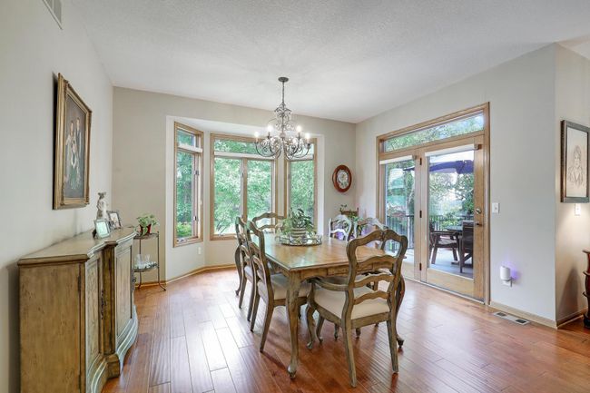Dining room leading to the deck. | Image 10