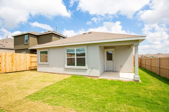 Back of house featuring stucco siding and a patio area | Image 25