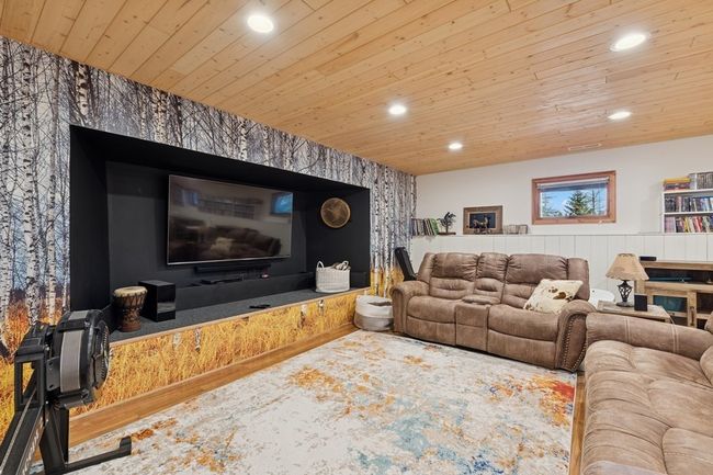Back of house with metal roof and wooden decks | Image 7