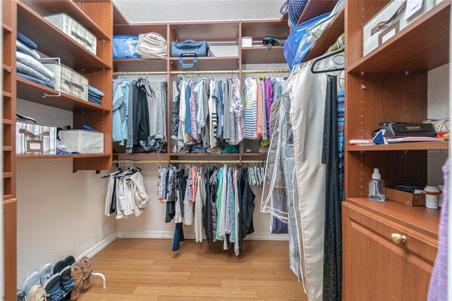 Primary walk-in closet with built-ins | Image 39