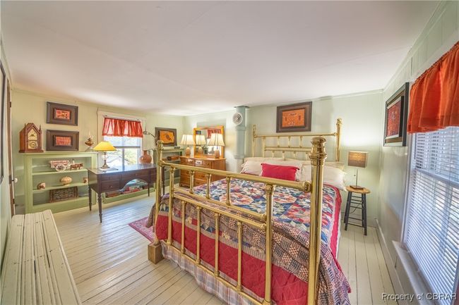 Bedroom featuring hardwood / wood-style floors | Image 14