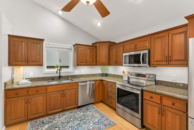 Kitchen offers newer stainless appliances and lots of counter and cabinet space | Image 3