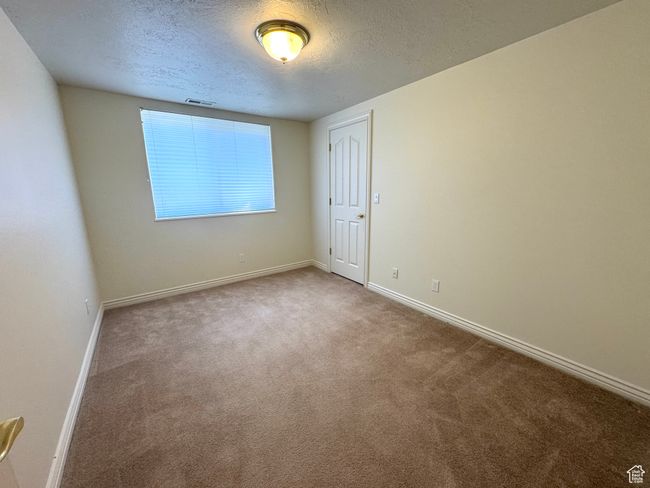Bedroom with walk-in closet. | Image 28