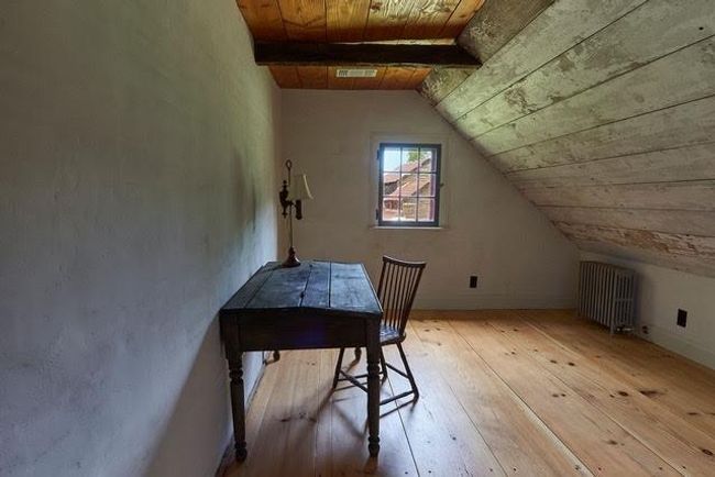 Additional living space with light wood-type flooring, radiator heating unit, vaulted ceiling with beams, and wooden ceiling | Image 8