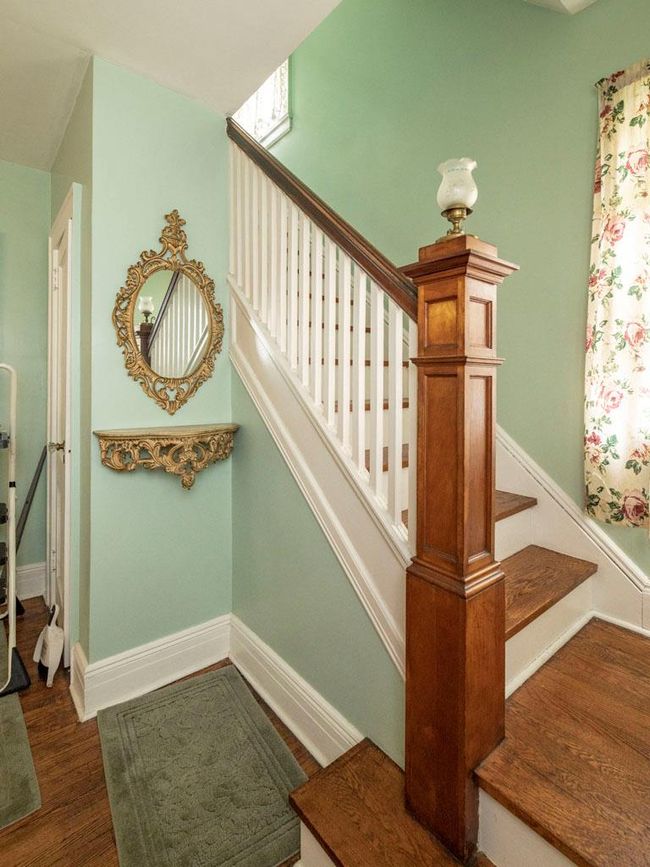 Staircase with wood finished floors and baseboards | Image 20