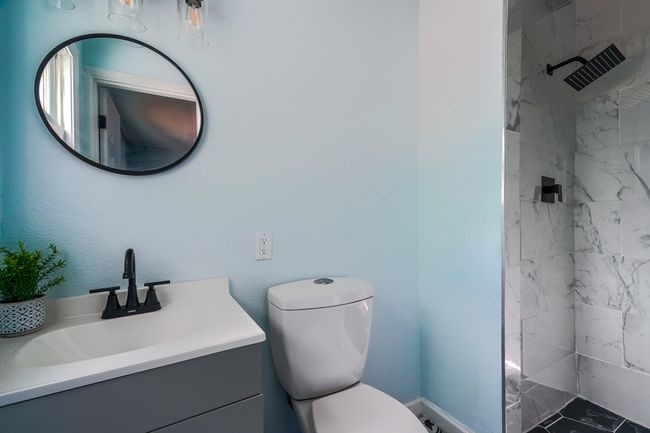 Full bathroom with vanity and a tile shower | Image 15
