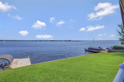 View of lake Conroe from upstairs primary bedroom balcony. | Image 2