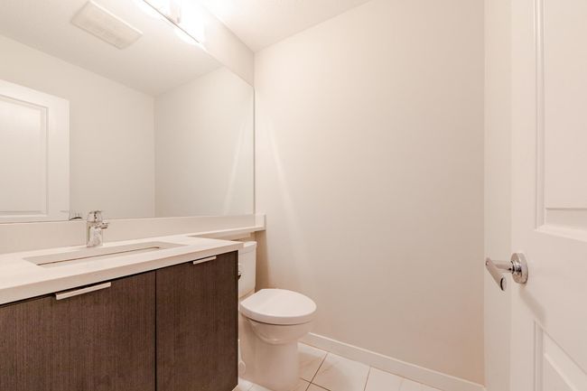 Bathroom featuring vanity and tile patterned floors | Image 15