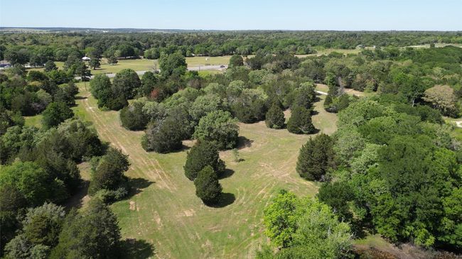 Bird's eye view with a view of trees | Image 9