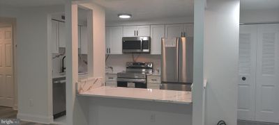 8357A - 8357 Claremont Woods Drive, Condo with 2 bedrooms, 2 bathrooms and null parking in ALEXANDRIA VA | Image 1