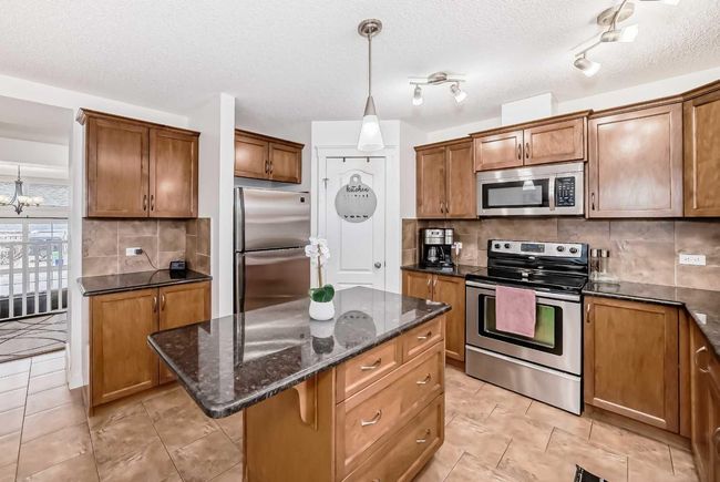 4004 - 2370 Bayside Rd Sw, Home with 3 bedrooms, 2 bathrooms and 2 parking in Airdrie AB | Image 13