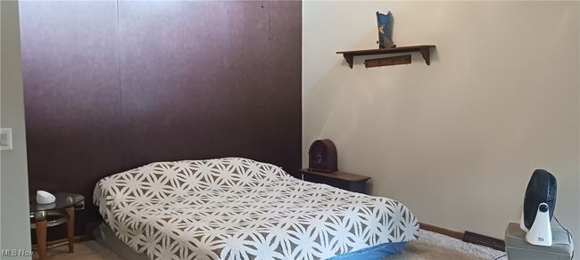 Bedroom featuring carpet | Image 10