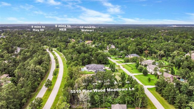 Build your dream home on this stunning wooded lot, where possibilities abound—whether you envision a timeless traditional design or a sleek modern retreat. Located in the prestigious Bender’s Landing Estates, this property offers more than just beautiful surroundings. | Image 4