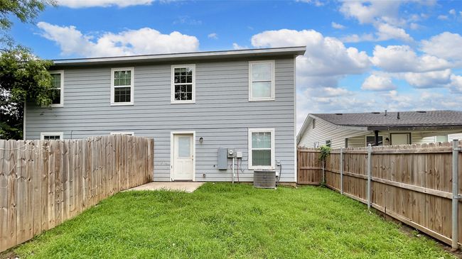 Back of house featuring a fenced backyard | Image 15