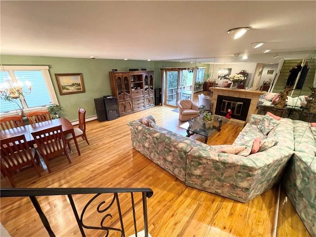 Another full view of the Living Room and Dining Room. | Image 8